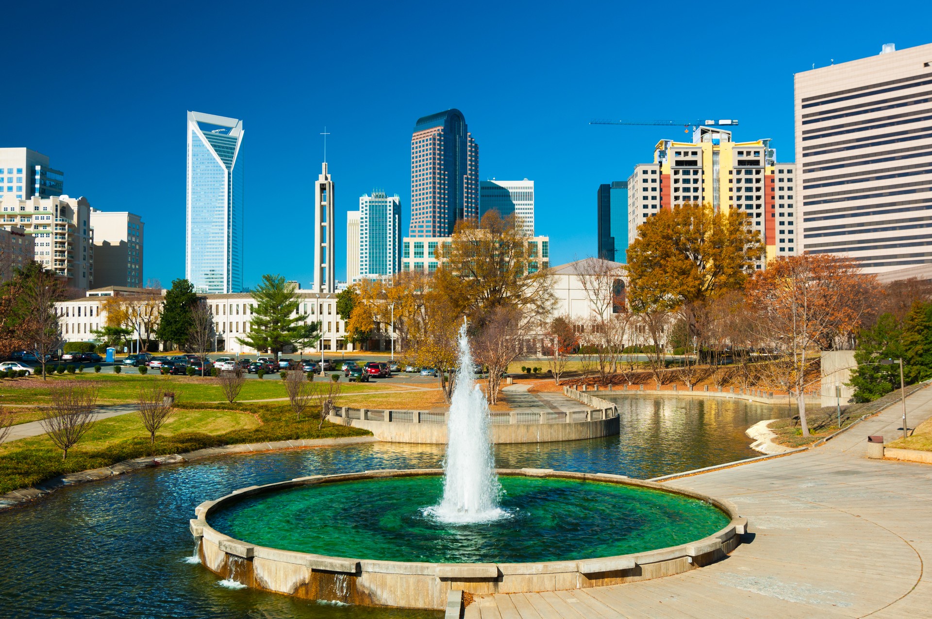 Charlotte Downtown Skyscrapers, with a Park and Fountain South end Swift Service Men movers near me