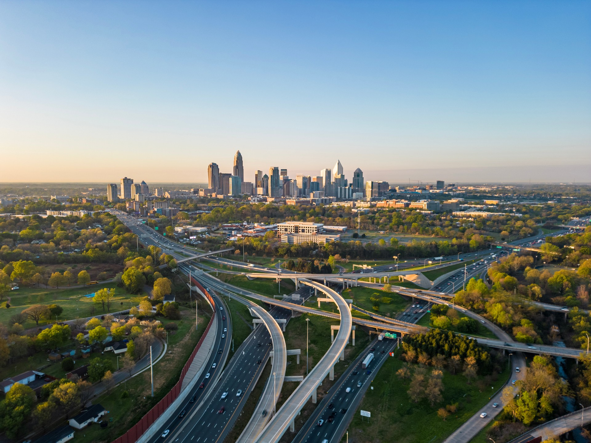 Charlotte NC Aerial | I-77 and I-485 Highways a Sunny Morning with Uptown Charlotte View Ballantyne, Swift Service Men movers near me